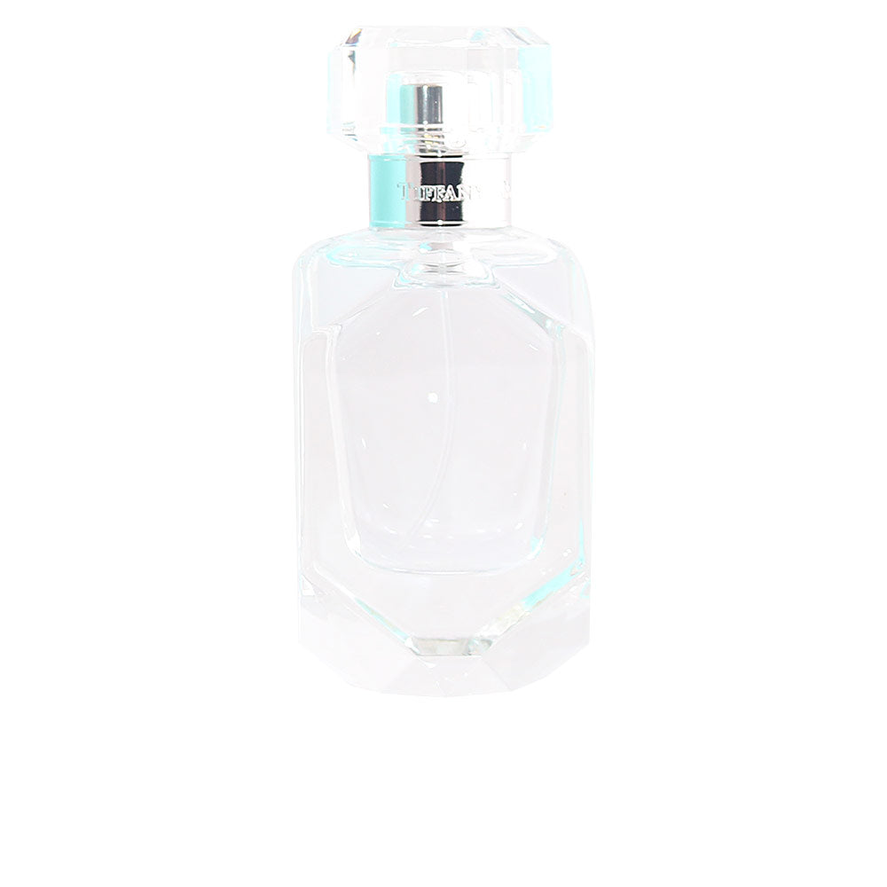 50 ml clear glass perfume bottle with pale floral eau, minimalist cap