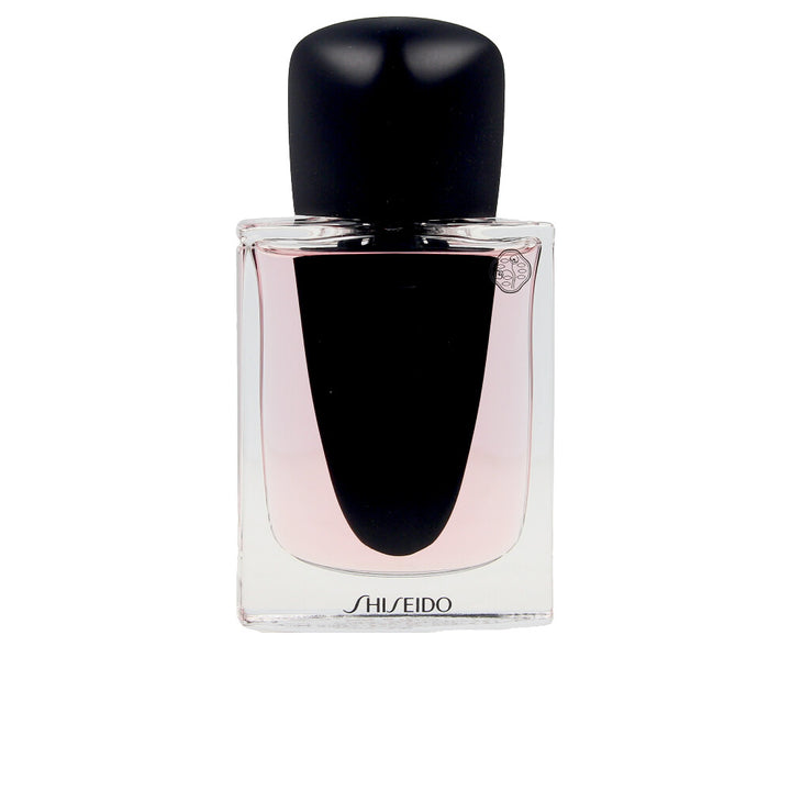 30 ml sculpted perfume bottle; floral‑woody scent for Women