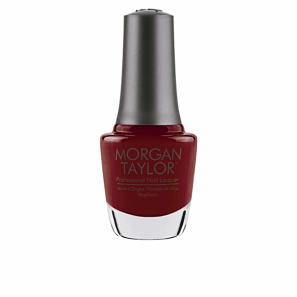 15 ml ruby-red nail lacquer in clear glass bottle with curved brush