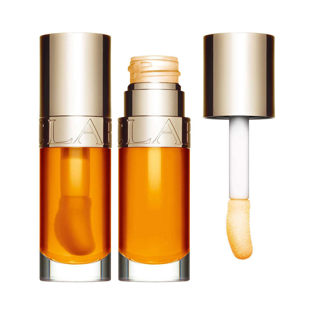 7 ml sheer botanical lip oil in warm honey shade with wand applicator