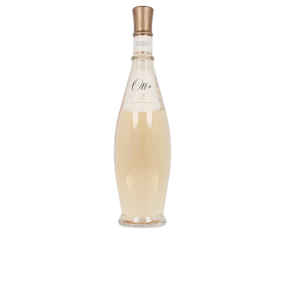 Pale pink Domaines Ott Château de Selle rosé in a clear wine glass, seaside inspiration