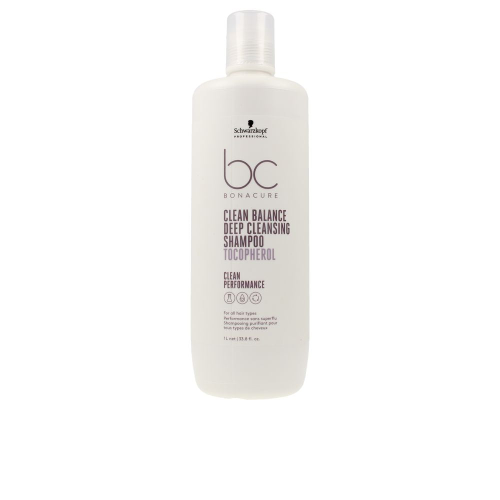 1,000 ml clear bottle of purifying shampoo labelled for deep cleansing, suitable for Women