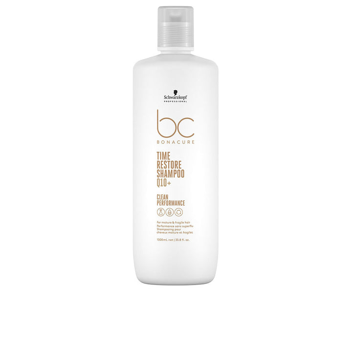 1 litre Unisex Q10 Time Restore shampoo bottle, clean white packaging