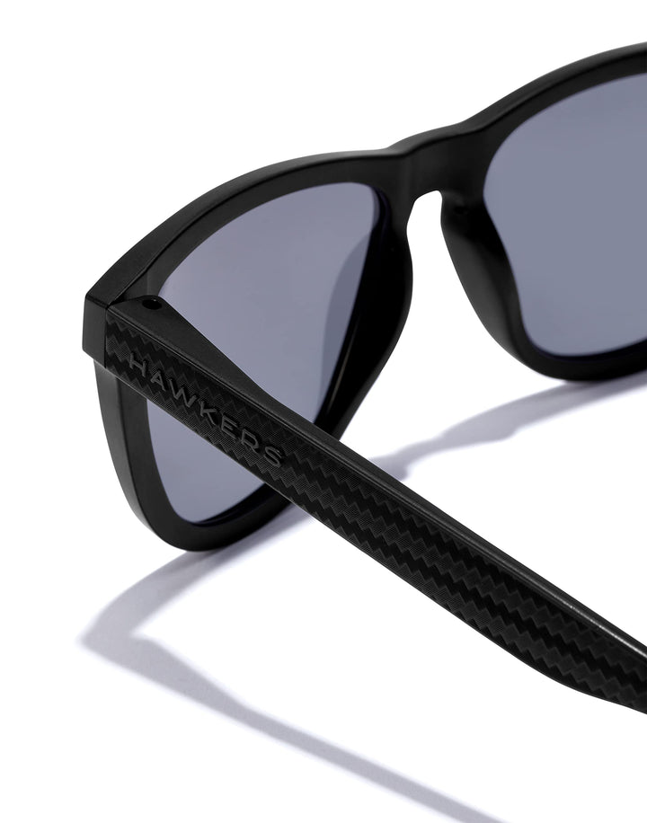 Unisex black square sunglasses with diagonal carbon-effect and blue chrome polarised lenses