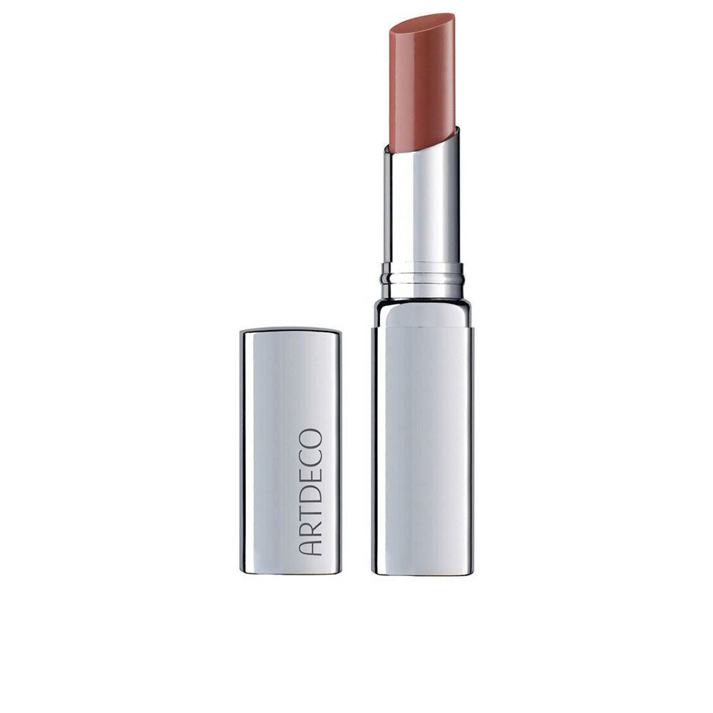 3 g apricot-hued lip balm stick with tint-reactive finish, compact tube
