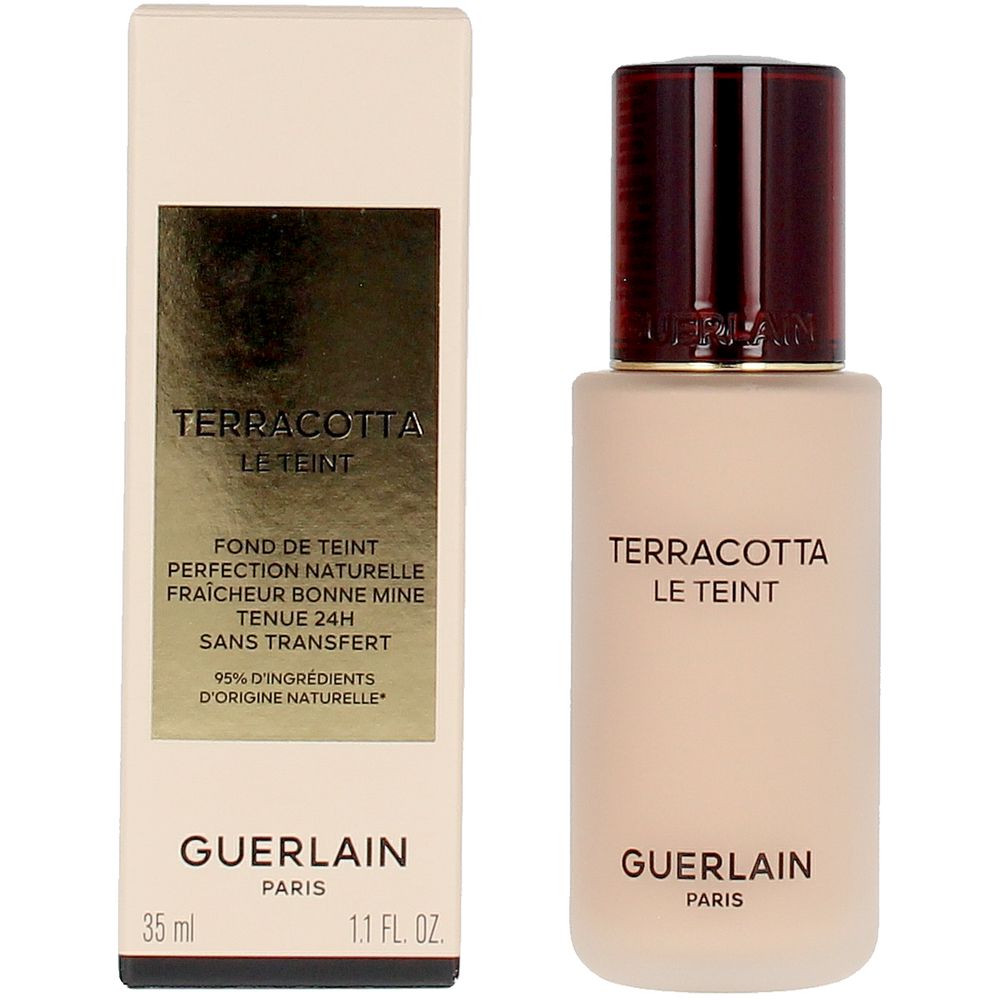 Frosted glass foundation bottle with dark brown embossed cap and gold-label rectangular box, Guerlain