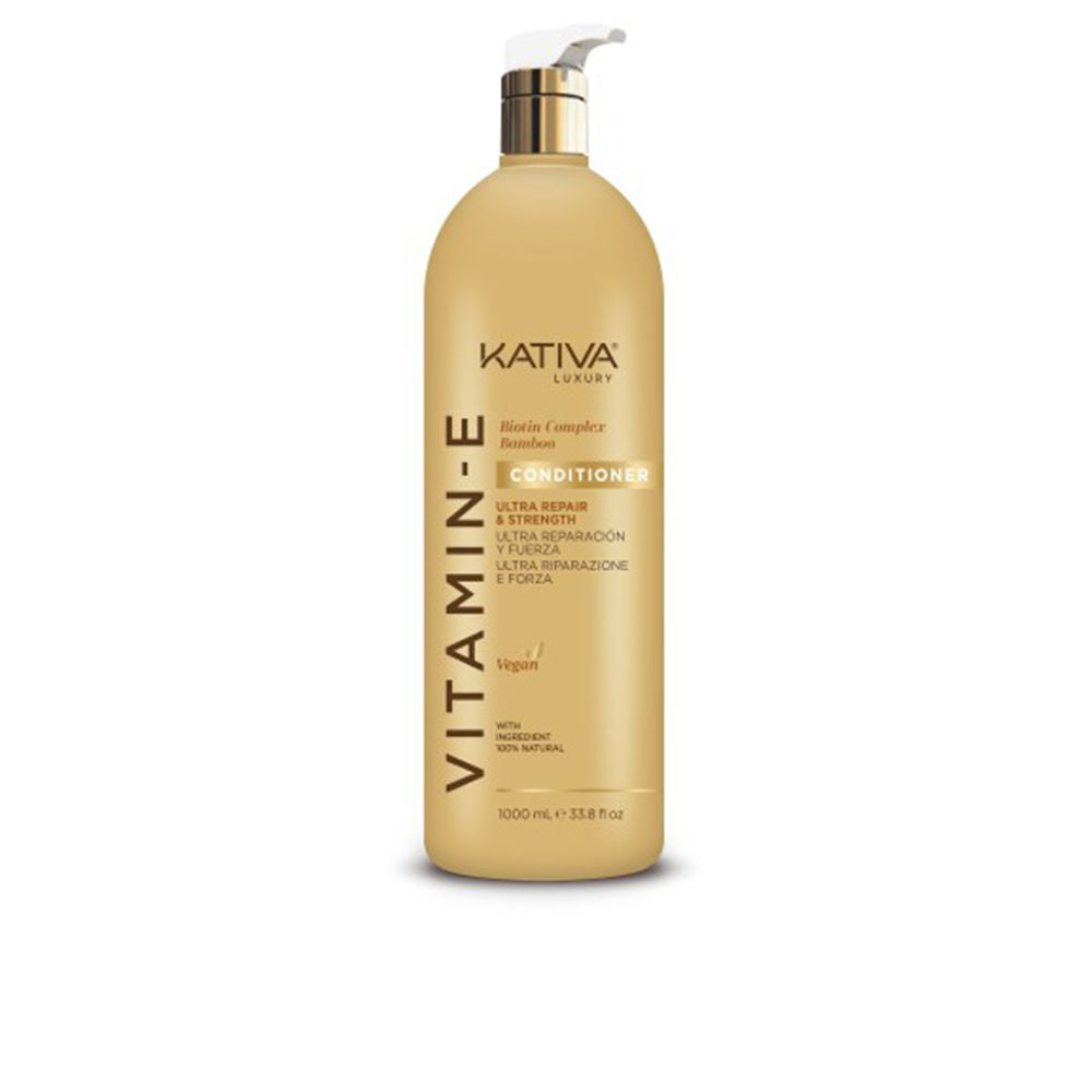 Large 1000 ml white conditioner bottle labelled Vitamin E &amp; Biotin Repair