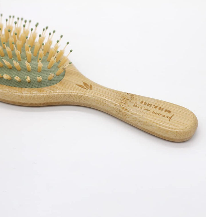 Small bamboo hairbrush with mixed nylon pins, compact travel size for Women