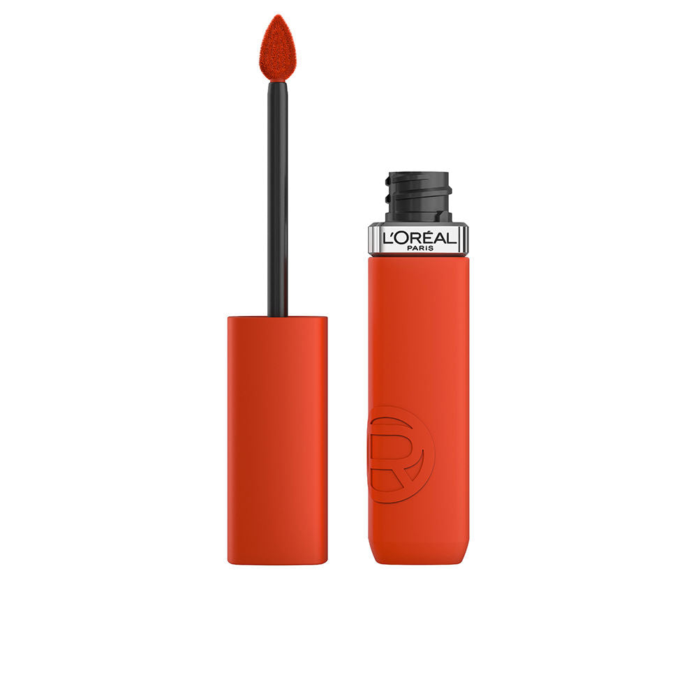 Tube of liquid matte lipstick with doe‑foot applicator and warm red shade, 1 unit