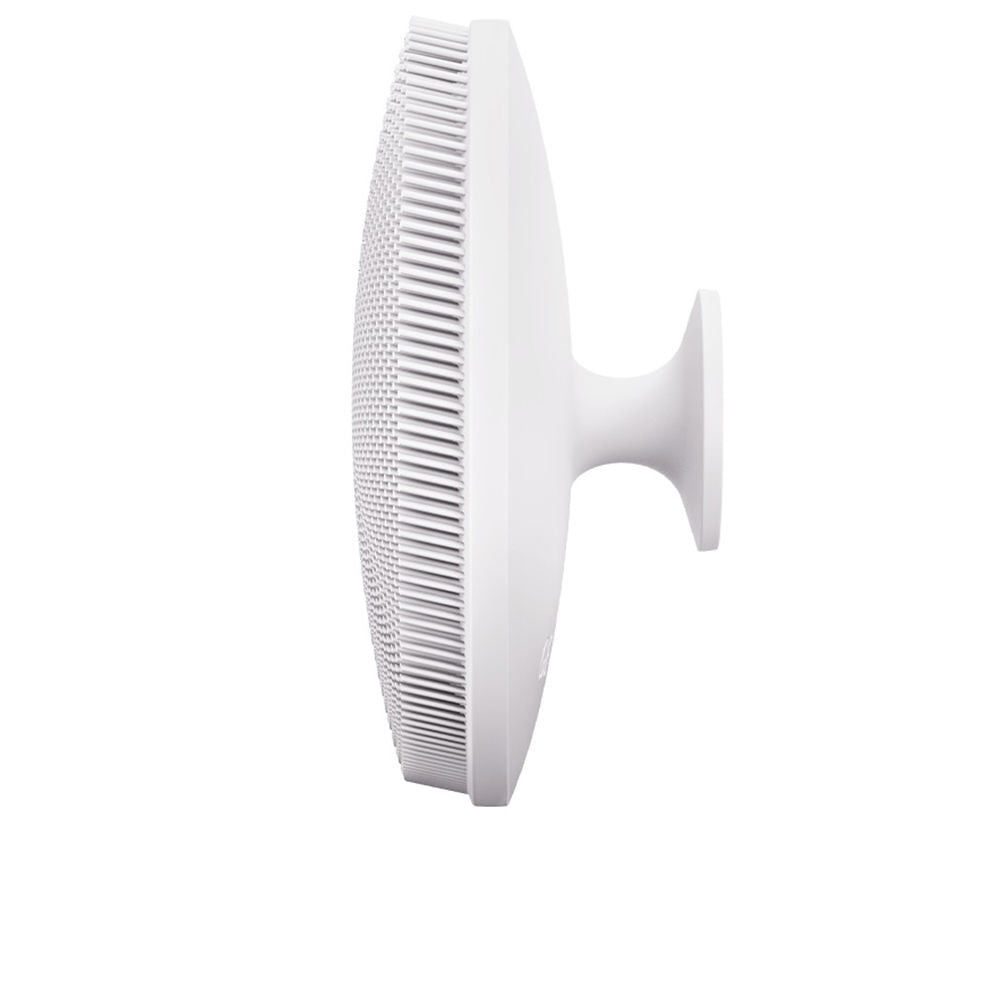 White compact 4‑in‑1 silicone facial brush with smart app connectivity