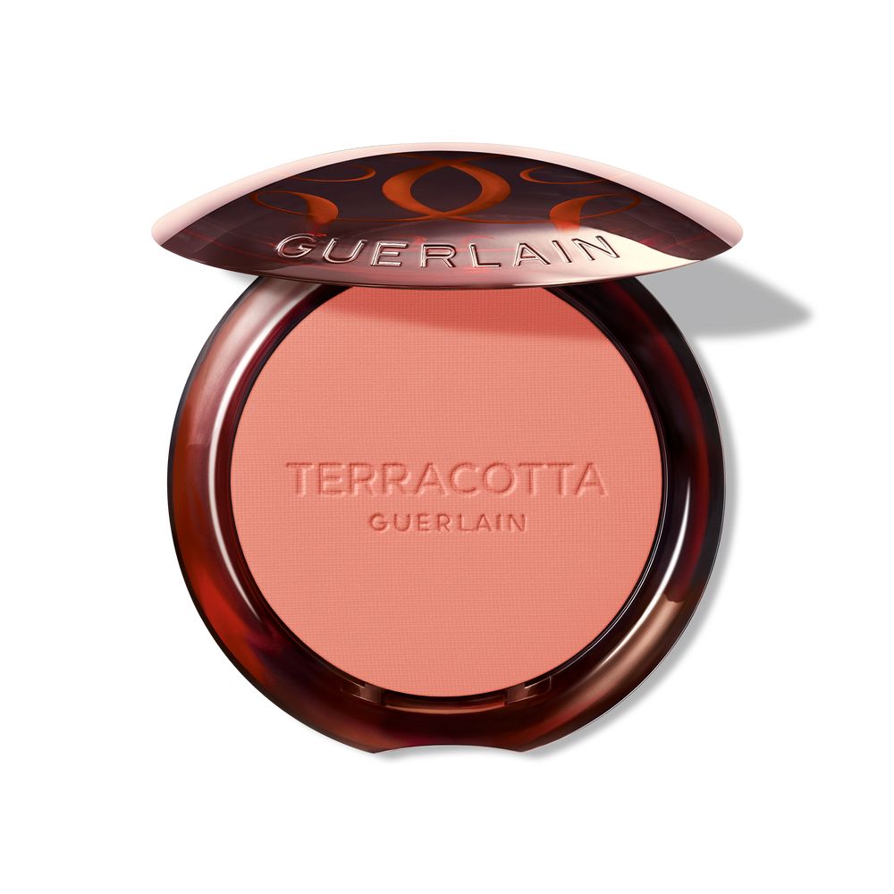 Mini terracotta powder blush compact in rose shade, finely milled powder