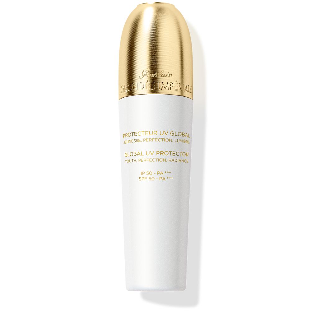Guerlain Tall white and gold plastic sunscreen bottle with gold rounded cap, embossed cap name, printed gold text