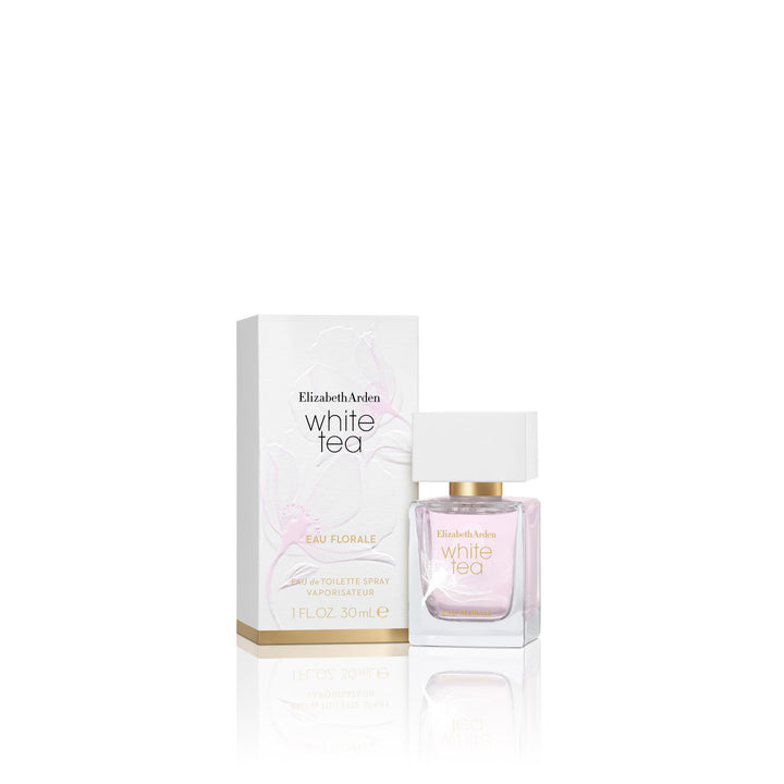 Clear slender bottle of pale rose eau de parfum with gold detailing, 30 ml
