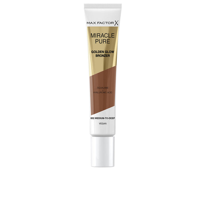 15 ml cream bronzer tube, medium–deep shade, silky finish