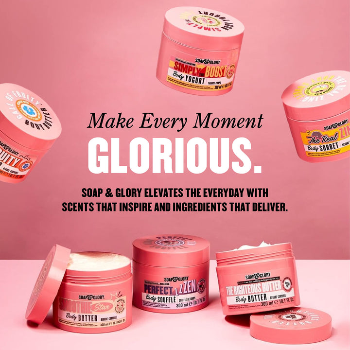Soap &amp; Glory Plastic cylindrical body wash bottle in pink, orange and beige with flip-top cap, fruit and floral graphics, bold text branding, measurement markings — .