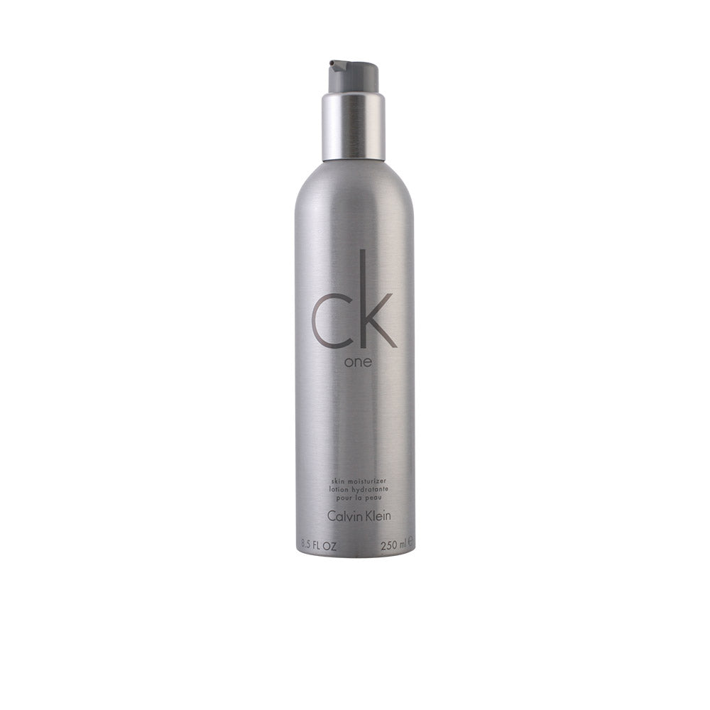 Calvin Klein Silver metal cylindrical skin moisturizer with pump, matte finish and printed logo, minimalist design