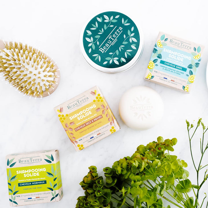 Round mint-green solid shampoo bar with paper wrap, 75 g, lemon accent