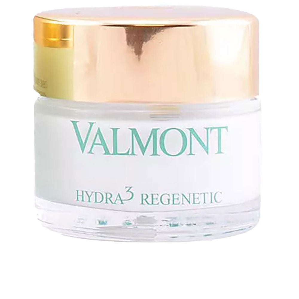 Valmont White round cream jar with gold metallic screw-on lid, minimalist luxury design on neutral background