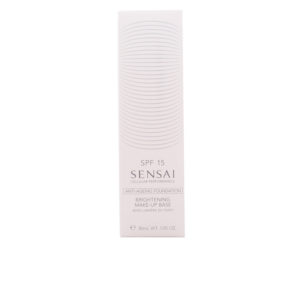Sensai Light pink cardboard rectangular box with printed text, logo, and horizontal curved lines pattern — .