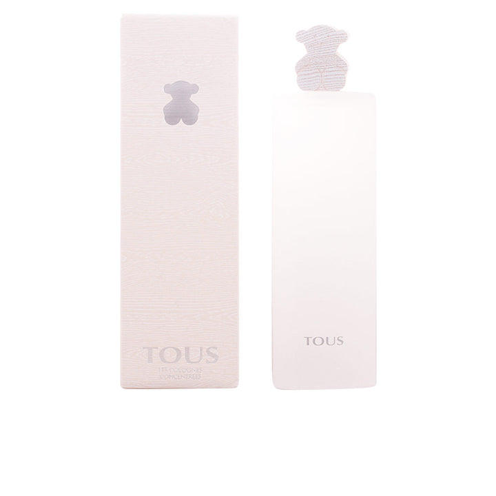 Tous Light pink rectangular glass perfume bottle with bear-shaped cap, textured cardboard box, silver logo