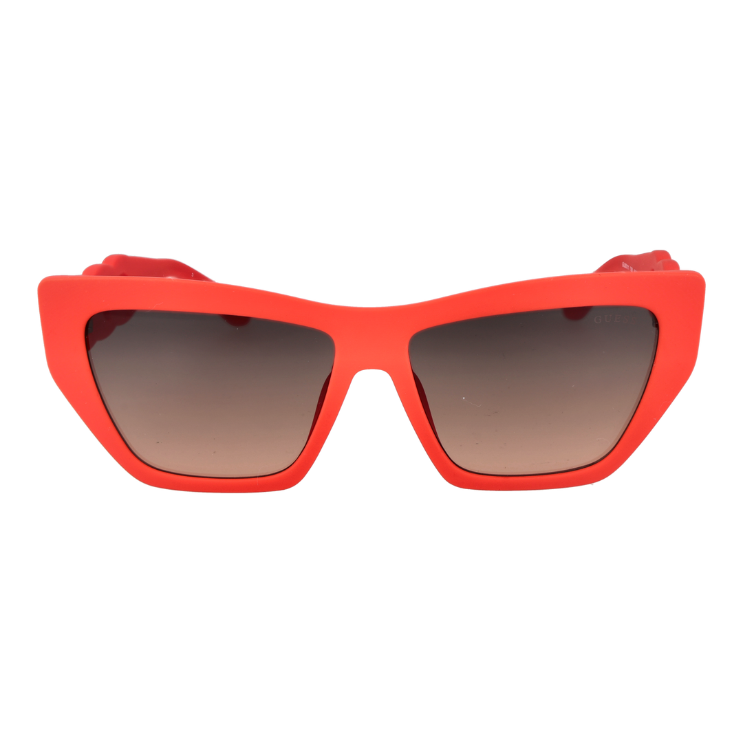 Red cat-eye sunglasses in glossy plastic with gradient lenses and gold chain-link temples, angled three-quarter view