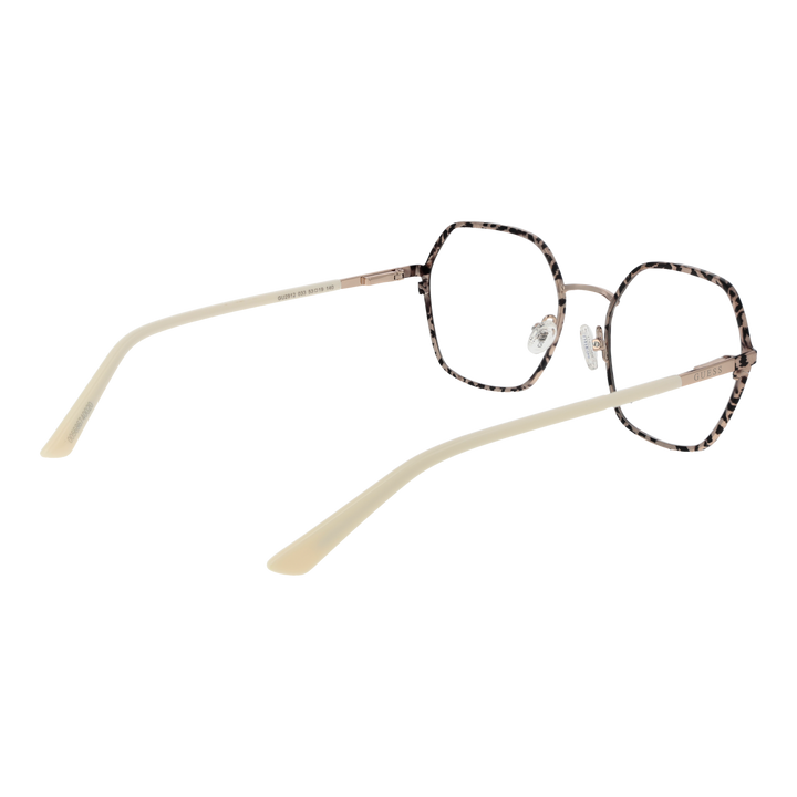 Beige and black tortoise rectangular eyeglasses with metal bridge and clear nose pads on neutral background