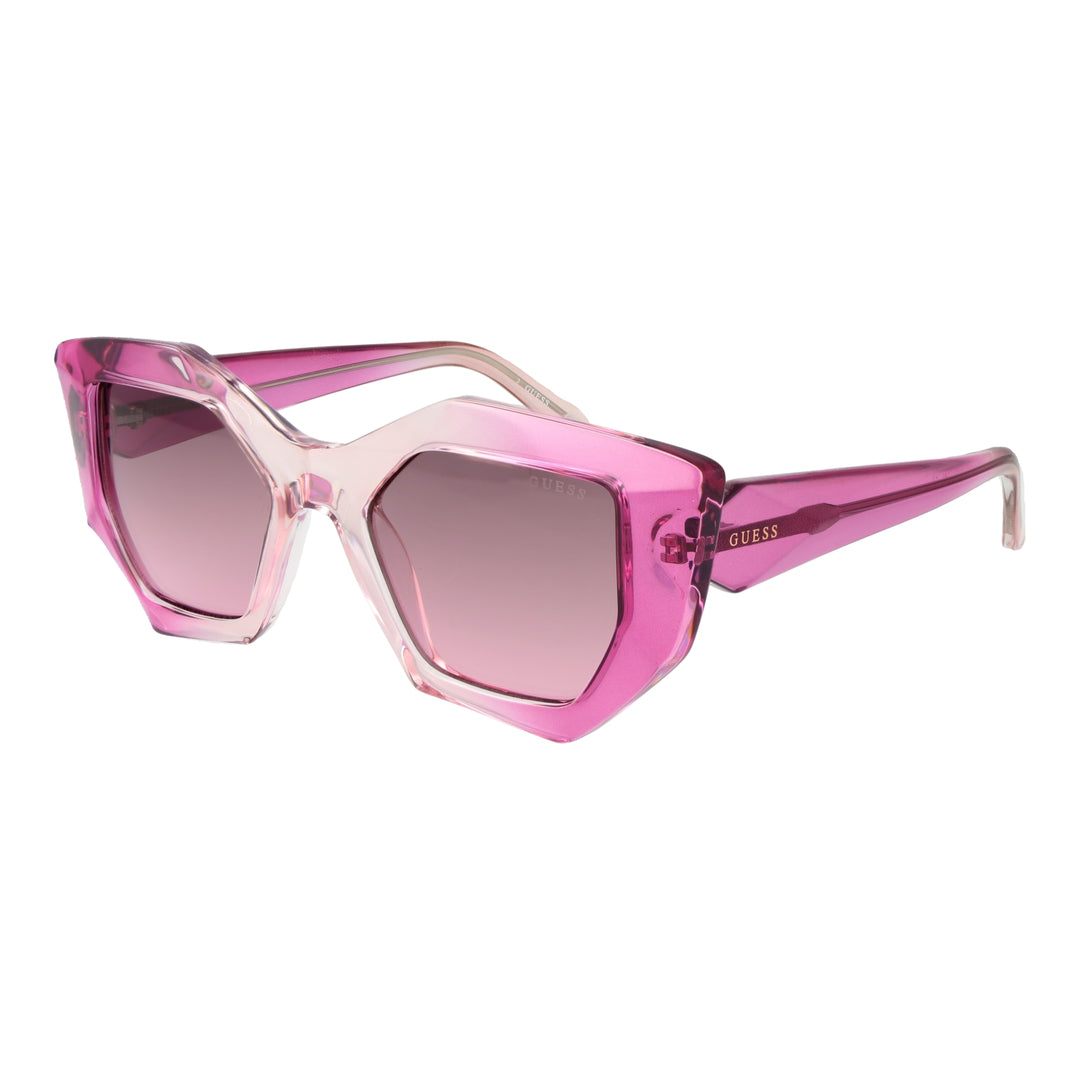 Pink translucent geometric hexagon sunglasses with gradient lenses and wide temples, logo on temple, front angle view