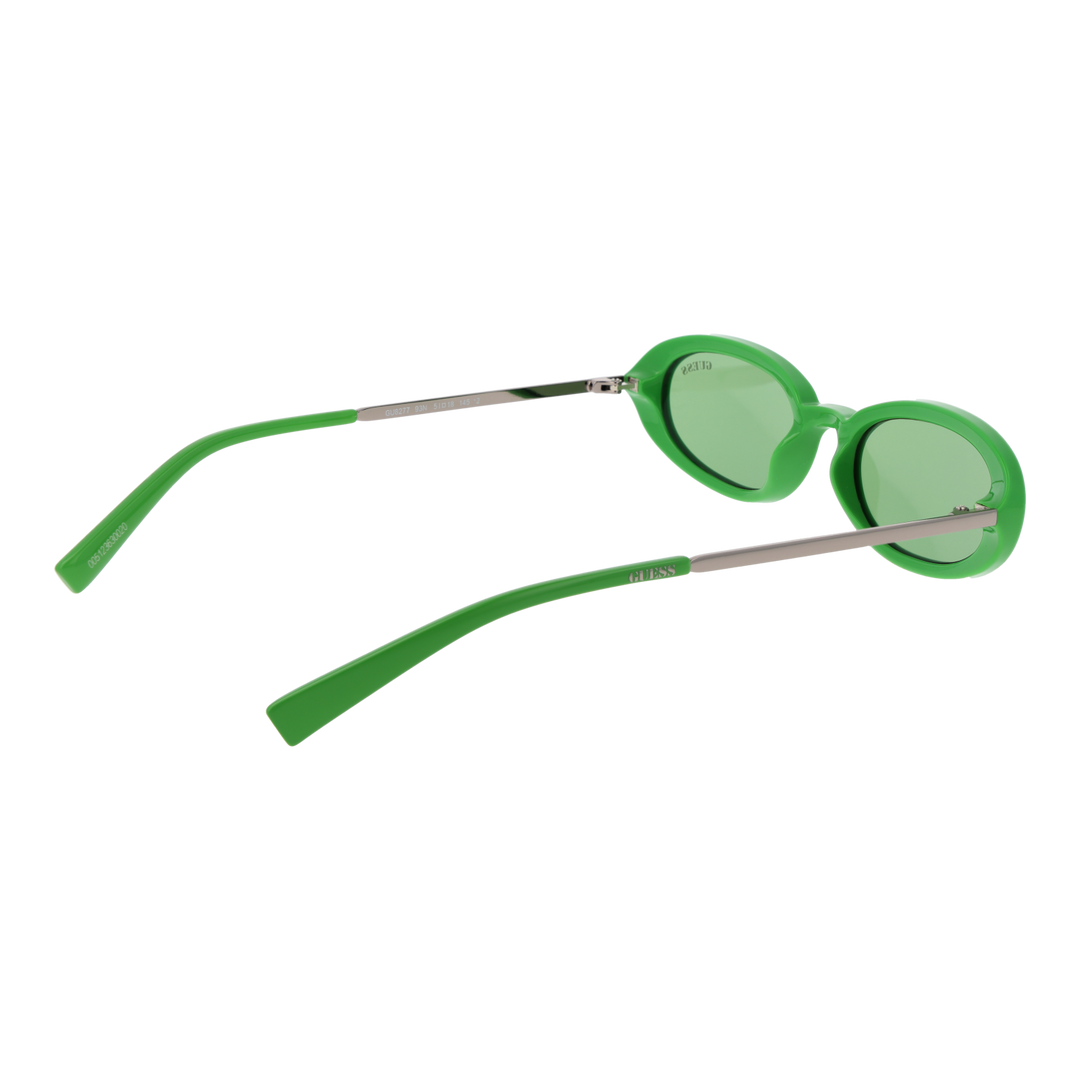 Green oval sunglasses with plastic frame and metal arms, Guess logo on lens and temples