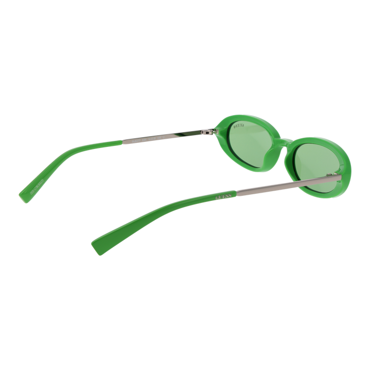 Green oval sunglasses with plastic frame and metal arms, Guess logo on lens and temples
