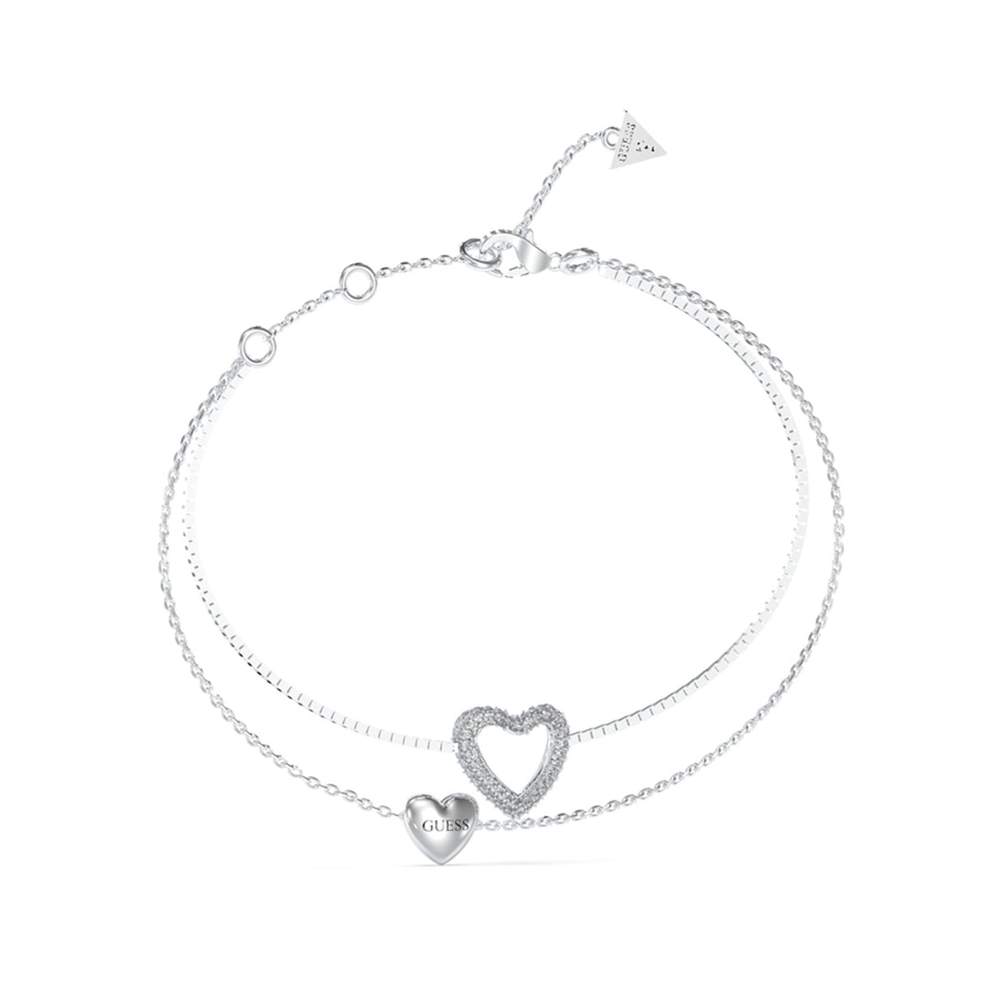 Delicate silver double-chain bracelet with small heart-shaped charms and adjustable clasp on neutral background