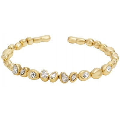 Open gold cuff bracelet with beaded texture and embedded clear crystals on wrist