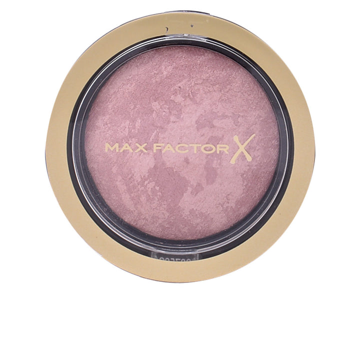 Compact 1.5 g multi‑tone cream blush in satin rose, buildable finish