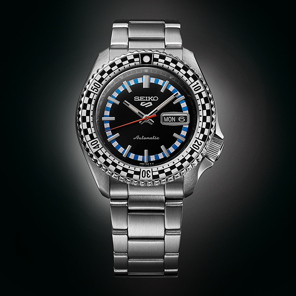 Stainless steel automatic sports watch on bracelet showing black dial and rotating bezel