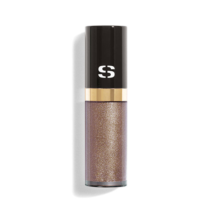 Slim 6.5 ml tube of pink-gold liquid eye shadow with precision applicator