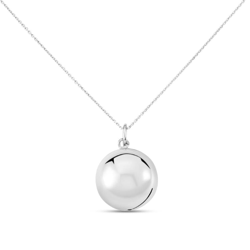 Delicate polished silver necklace with spherical pendant on fine chain against neutral background
