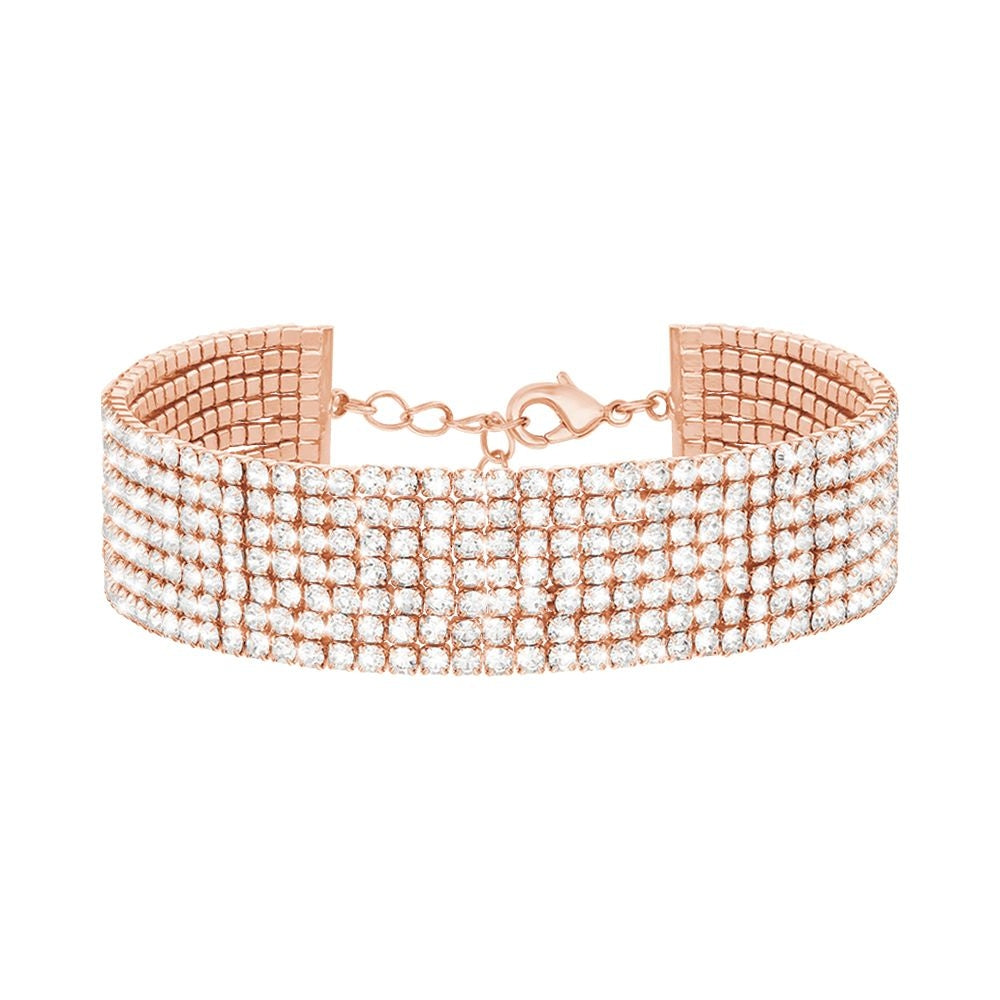 Rose gold multi-row crystal bracelet on white background with adjustable clasp visible